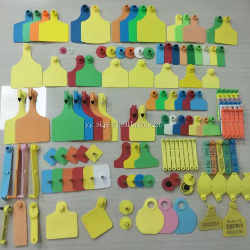 Large collection of ear tags in multiple styles and colours